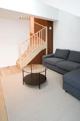 a living room with a couch and a coffee table at Appartment Douvres 7 in Brussels
