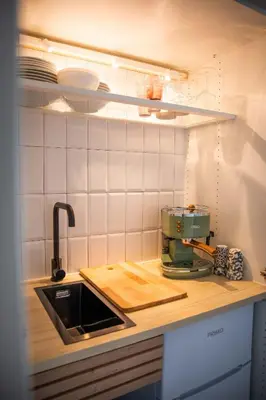 a kitchen with a counter top with a mixer on it at Chambre d Amis in Lokeren