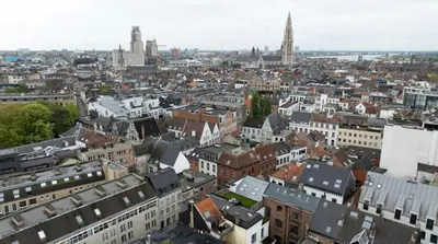 an aerial view of a city with buildings at Luxury Designer Penthouse with Roof Terrace in Antwerp
