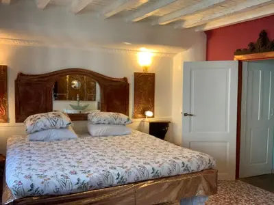a bedroom with a bed with two pillows on it at House Le Prince D'Anvers in Antwerp