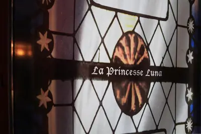 a stained glass window with a butterfly on it at House Le Prince D'Anvers in Antwerp