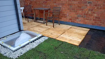 a patio with two chairs and a table and a table and chairs at Lieria in Lier