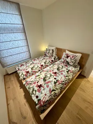 a bed in a bedroom with at The 9th Street Residence in Brussels