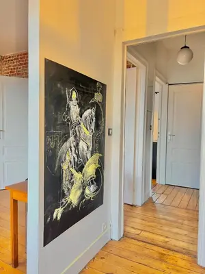a large painting on a wall in a room at Big cosy Family Duplex near Grande Place in Brussels