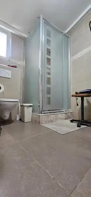 a bathroom with a shower and a toilet at Cozy Apartment in Brussels of 75 m² in Brussels