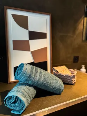a sock sitting on a counter in front of a mirror at NEW Luna residences - in the city center in Antwerp