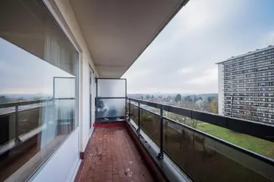 a room with a balcony with a view at Brussels Expo Elegant residence in Brussels