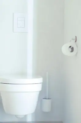 a bathroom with a toilet and a roll of toilet paper at Stylish Apartment City Center in Antwerp