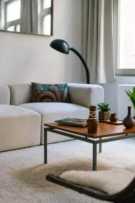 a living room with a couch and a coffee table at A Place Antwerp - Boutique Suites & Flats - Leeuwenstraat 15 in Antwerp