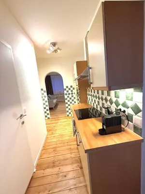 a kitchen with a sink and a counter top at EU District Loft in Brussels