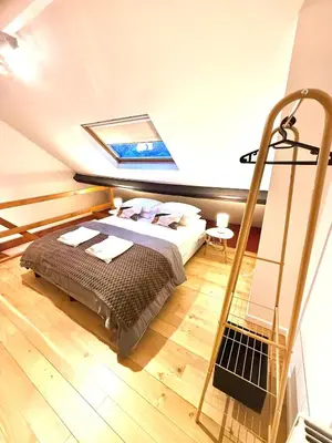 a bedroom with a bed in a room at EU District Loft in Brussels