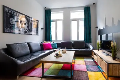 a living room with a couch and a table at heartatd'Anvers Original in Antwerp