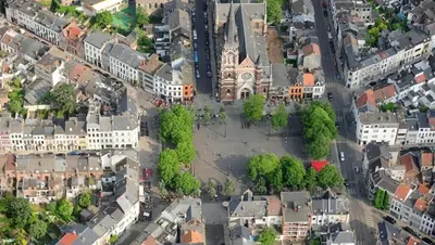 an aerial view of a city with a church at Spacious 3-bedroom apartment with terrace Zurenborg in Antwerp