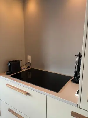 a room with a counter with a black counter top at Spacious luxurious 1 bedroom stay in the city center in Antwerp