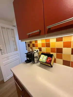 a kitchen with a counter with a coffee maker on it at European Lodge Studio Brussels in Brussels