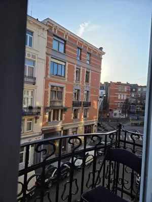 a view from a balcony of a building at Pb155, balcony with street view in Brussels