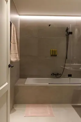 a bathroom with a shower with a bath tub at Bed and Breakfast L'Orée Du Bois in Wavre