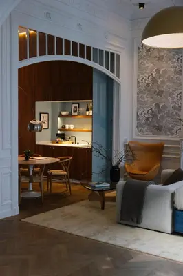 a living room with a couch and a table at A Place Antwerp - Boutique Suites & Flats - Schuttershofstraat 55 in Antwerp