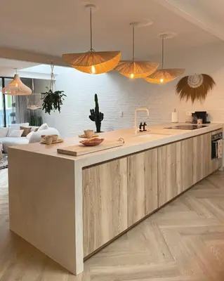 a kitchen with a large island in the middle at LoftAnno1940 in Lokeren