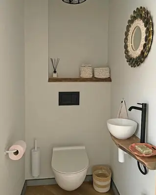 a bathroom with a toilet and a sink at LoftAnno1940 in Lokeren
