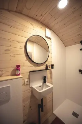 a bathroom with a sink and a mirror at Laurel & Hardy in Mechelen