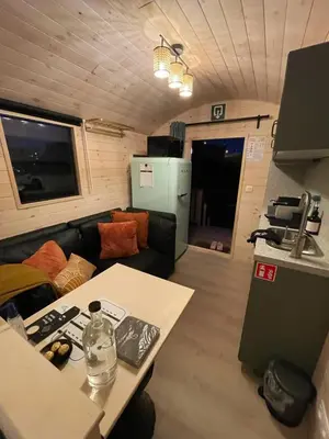 a living room with a couch and a table at Laurel & Hardy in Mechelen