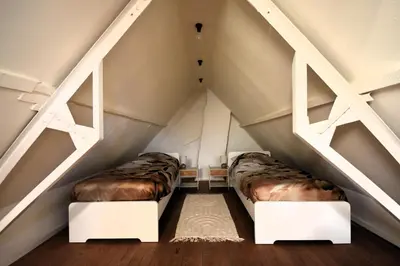 two beds in the attic of a house at De Durme in Temse