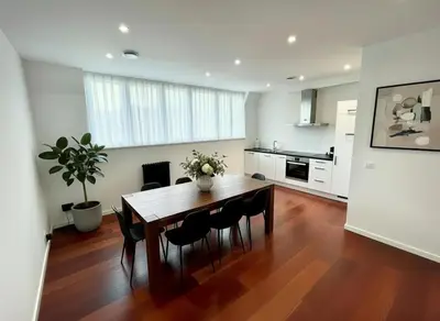 a kitchen and dining room with a table and chairs at Rooms at Université Libre de Bruxelles in Brussels