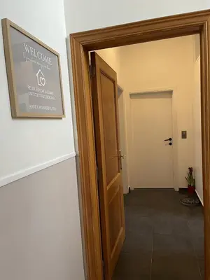 an open door to a hallway with at Beautiful condominium with jacuzzi in Brussels