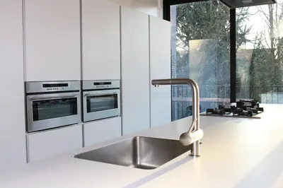 a kitchen with a stainless steel sink and appliances at Premium Loft in Antwerp Featured on TV in Antwerp
