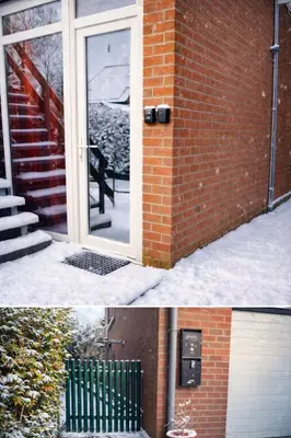 a door to a brick building with snow on the ground at Studio confortable situé à Woluwe Saint Lambert in Brussels