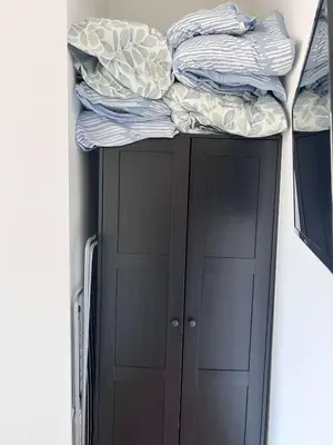 a bed on top of a cabinet in a room at Cosy Family Apartment for up to 9 guests near Brussels Midi Station in Brussels