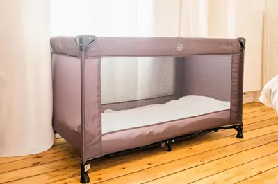 a small bunk bed in a room with a wooden floor at New Apartment center of Trendy St Gille in Brussels