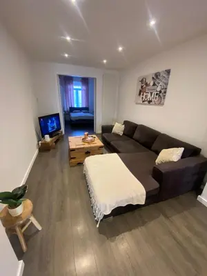 a living room with a couch and a table at Sportpaleis afasdome in Antwerp