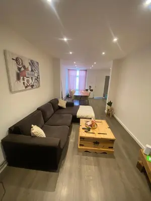 a living room with a couch and a coffee table at Sportpaleis afasdome in Antwerp