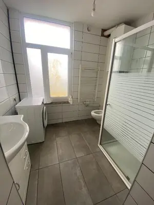 a bathroom with a shower and a sink and a toilet at Sportpaleis afasdome in Antwerp