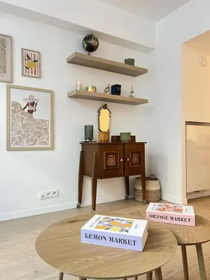 a room with two tables and a table with two boxes on the floor at Modern & Elegant Apartment near Montgomery in Brussels