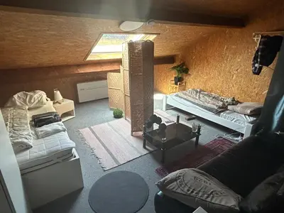 an overhead view of a living room with two beds at Steves Place Haasdonk in Beveren