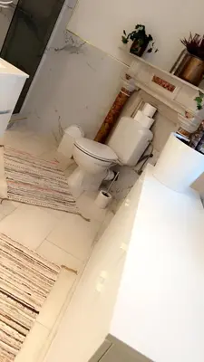 a bathroom with two toilets in a room at Majorelle in Brussels