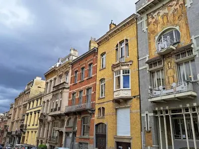 a row of buildings on a city street at Bright and cosy apartment in Bruxelles in Brussels