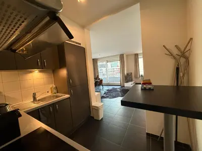 a kitchen with a sink and a counter top at Stunning Apartment with 2 Bedrooms - Sleeps 6 in Brussels