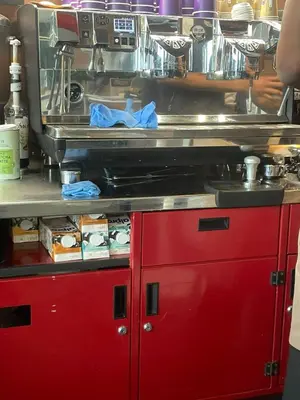 a kitchen with red drawers and a counter top at Tomorrowland 350 m Close Quiet Stay in Boom