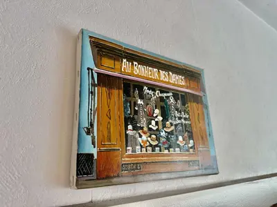 a toy window with figurines in it on a wall at Alhambra hideaway prime location in Brussels
