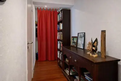 a room with a desk and a red curtain at Alhambra hideaway prime location in Brussels