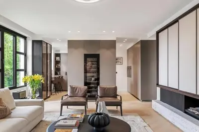 a living room with a couch and a fireplace at Superb Apartment Pierson in Brussels