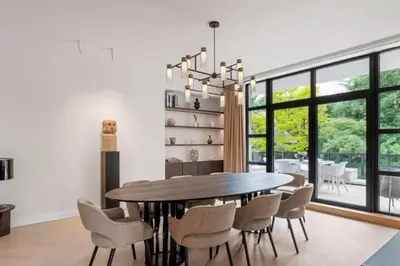 a dining room with a table and chairs at Superb Apartment Pierson in Brussels