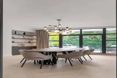 a dining room with a table and chairs at Superb Apartment Pierson in Brussels