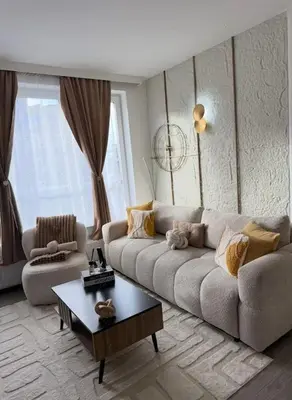 a living room with a couch and a coffee table at Charming apartment in Bruxelles in Brussels