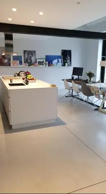 a room with a counter and a table and chairs at Tomorrowland2026 Basecamp in Mechelen