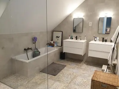 a bathroom with two sinks and a tub and a shower at Tomorrowland2026 Basecamp in Mechelen